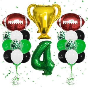 Detail of #1 Champion trophy and green number 4 balloon for football party decor