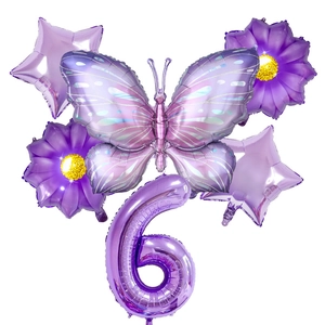 Detailed set of purple butterfly and star foil balloons for a 6th birthday celebration