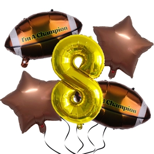 Detail of Super Bowl theme balloon set with gold number 8 and brown football balloons
