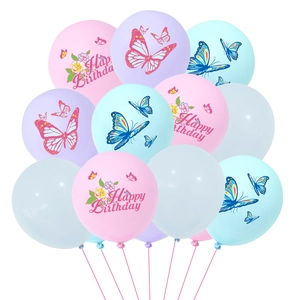 Detail of latex butterfly balloons with Happy Birthday print and macaron colors