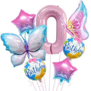 Close-up of pink 40 inch number 0 balloon with blue gradient butterfly and stars