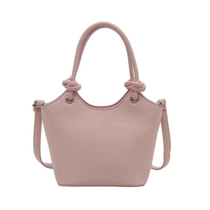 Pink vintage bucket bag with cute embossed heart patterns and top handle straps