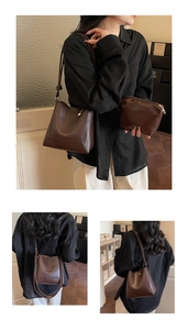 Detail view of brown leather bucket bag set showing shoulder strap knot and pouch