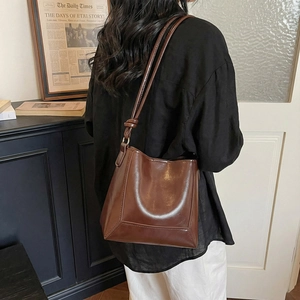 Retro brown large capacity shoulder bucket bag with stylish knotted strap detail