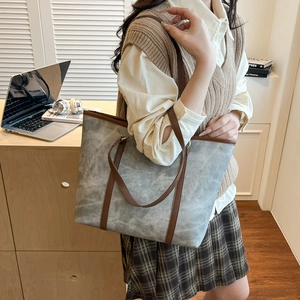 French style grey suede tote bag with brown leather handles for commuting and school