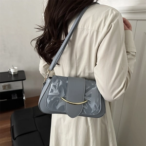 Borsa a spalla baguette grigio-blu con fibbia dorata e motivi geometrici di tendenza