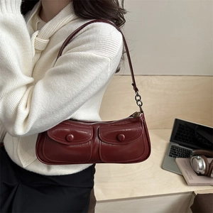 Vintage burgundy faux leather shoulder bag with double front pockets and metal chain