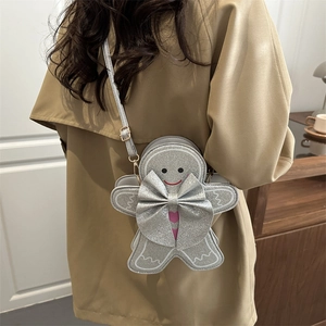 Sac à bandoulière bonhomme en pain d'épices argenté brillant avec nœud et cœur rose
