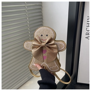 Vue détaillée du sac bandoulière bonhomme en pain d'épices avec paillettes dorées