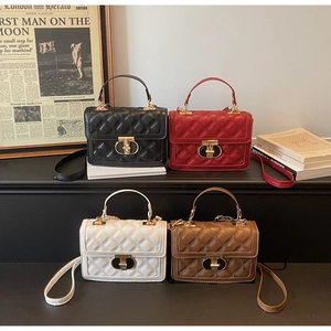 Chic quilted crossbody bags in black, red, white, and brown with gold hardware