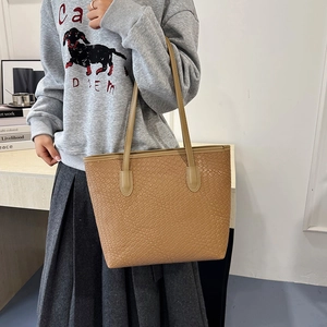 Large capacity camel woven leather tote bag with long straps for chic daily commute