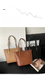 Detailed view of woven leather tote bags available in beige, brown, and black colors