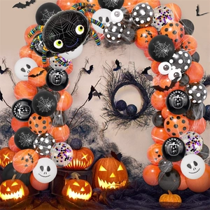 Halloween balloon arch kit with orange pumpkin patterns and giant spider foil balloon decor