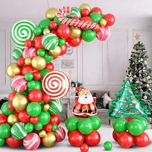 Christmas balloon arch kit with Santa, tree, candy foil balloons in red green and gold