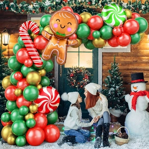 Detailed view of gingerbread man and candy cane foil balloons for Christmas arch kits