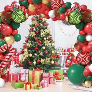 Christmas balloon arch kit with red, green, and gold latex balloons and candy canes