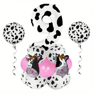 Detail of cow print number 2 balloon with pink latex accents for 2nd birthday party decoration