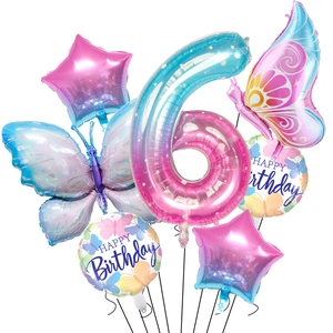 Detail of gradient butterfly and star foil balloons with large number 6 for 6th birthday