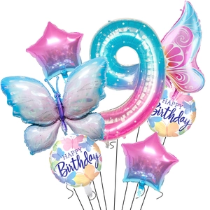 Macro detail of the gradient butterfly and number 9 foil balloon set for birthday decor