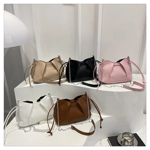Detailed display of five pleated shoulder bags in beige, black, pink, white, and brown