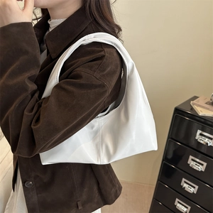 Minimalist white hobo underarm bag in glossy patent leather for women's office wear