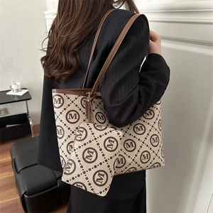 Classic monogram tote bag set with matching zipper pouch for daily commuting style