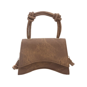 Retro brown hourglass crossbody bag with signature curved base and knotted handle detail