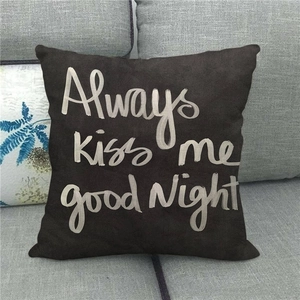 Linen throw pillow cover with white Always Kiss Me Good Night text on dark fabric