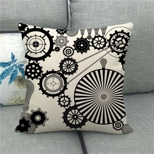 Close-up of geometric checkerboard linen pillowcase with industrial gear and compass print