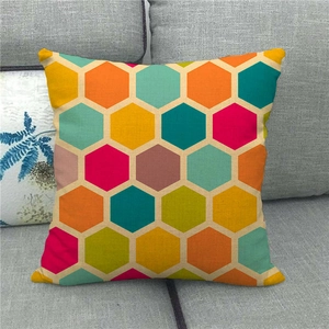 Close-up of rainbow hexagonal pattern on linen pillowcase with woven texture detail