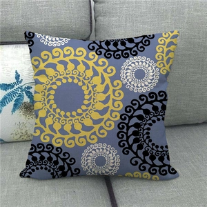Detailed texture of linen cushion cover with modern geometric circle patterns in blue