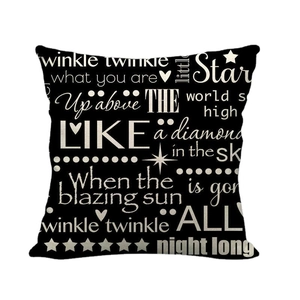 Black linen pillow cover with white Twinkle Twinkle Little Star text and star patterns