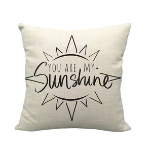 Linen pillow cover with sunshine graphic and You Are My Sunshine quote on white background