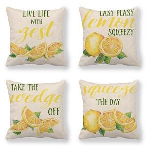 Set of four linen cushion covers with watercolor lemon patterns and motivational quotes