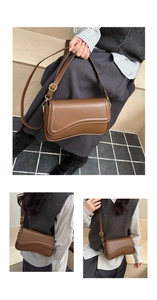 Detailed view of brown leather bag showing versatile carrying styles and matte gold hardware