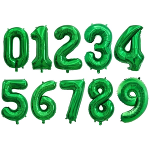 Detail of green number 0-9 foil balloons showing inflation port and shiny metallic texture