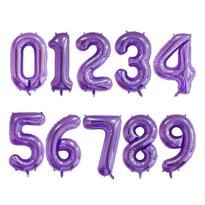 Close-up of metallic purple number balloons 0-9 for birthday party decorations