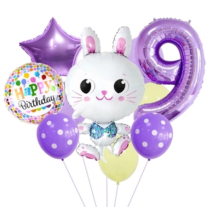 Détail du kit d'anniversaire 9 ans avec ballon lapin blanc et chiffre neuf violet