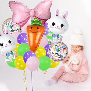 Close-up of rabbit and carrot foil balloons with colorful polka dot latex party balloons