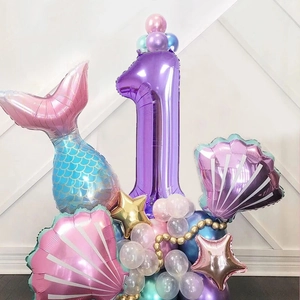 Mermaid theme 1st birthday balloon set with purple number 1, tail and shell balloons