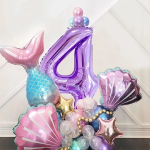 Mermaid theme birthday party balloon set with giant purple number 4 and seashell decor