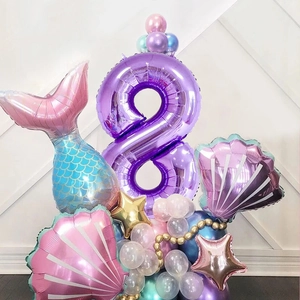 Detail view of mermaid theme number 8 balloon pillar with purple shell and golden star
