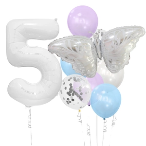 Macro detail of butterfly balloon set with silver sequins and white number 5 for birthdays