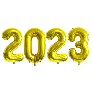 Detailed view of glossy metallic gold 2023 number foil balloons for graduation party