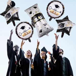 5-piece graduation foil balloon set featuring black and gold stars and circles in sky