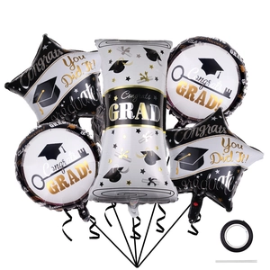 Detailed 5-piece graduation foil balloon set with Congrats and Grad star patterns