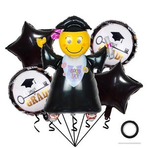 Detail of graduation balloon set with smiley face graduate and black star balloons