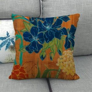 Linen pillowcase with vintage oil painting autumn leaf pattern on a gray sofa