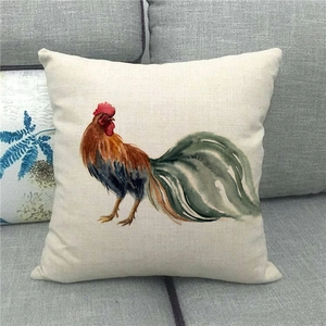 Detail of linen texture and watercolor rooster print on rural style square pillowcase