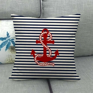 Linen anchor print cushion cover with blue stripes on a modern grey sofa couch